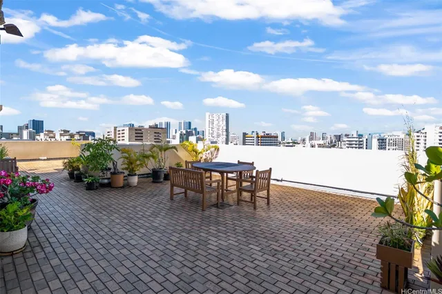 a view of a terrace with furniture
