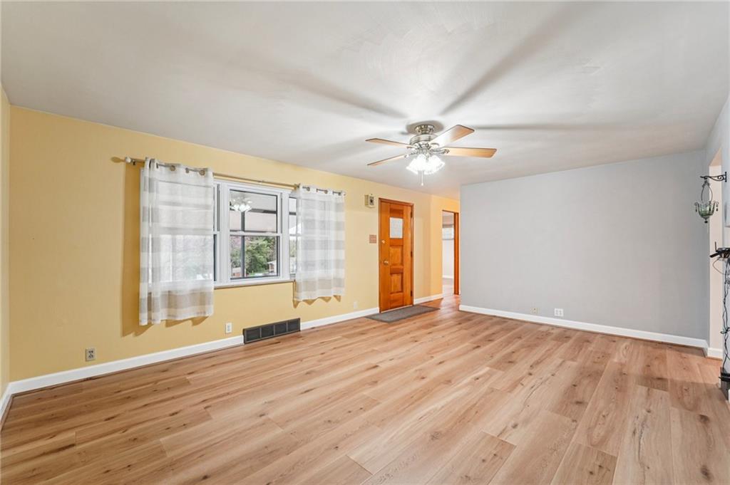 644 Grange Drive Apollo, PA 15613 - Photo 20 of 46 Spacious living room leading to coveted screened in Porch