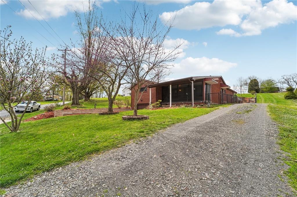 644 Grange Drive Apollo, PA 15613 - Photo 2 of 46 Drive number 2 leading by the kitchen and covered portico for convenient loading and unloading