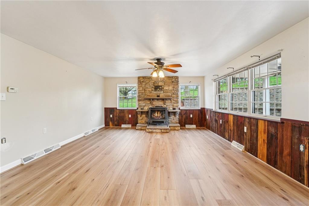 644 Grange Drive Apollo, PA 15613 - Photo 4 of 46 Eldorado Brick fireplace with Electric remote controlled fireplace.