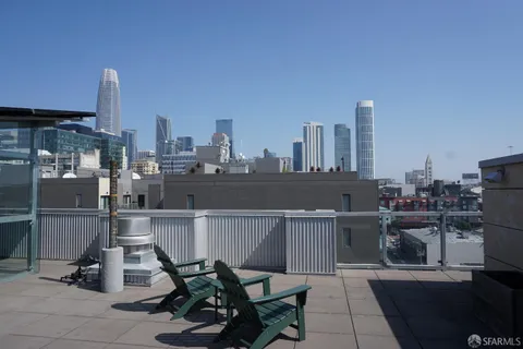 a view of a terrace with sitting area
