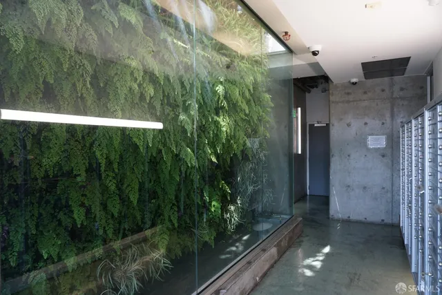 a picture of a bathroom with shower and small yard