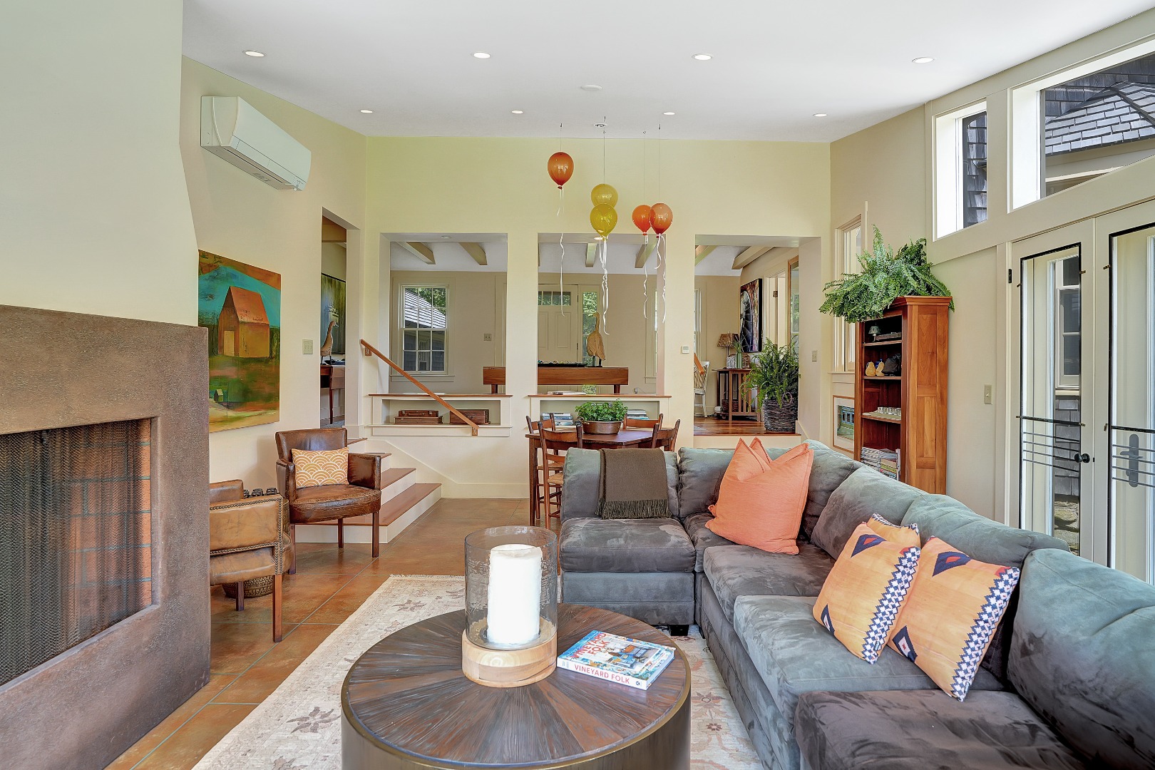 122 Old Farm Road Chilmark, MA 02535 - Photo 14 of 36 a living room with fireplace furniture and a painting on the wall