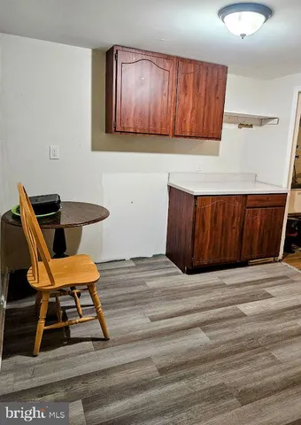 a view of room with workspace and mirror