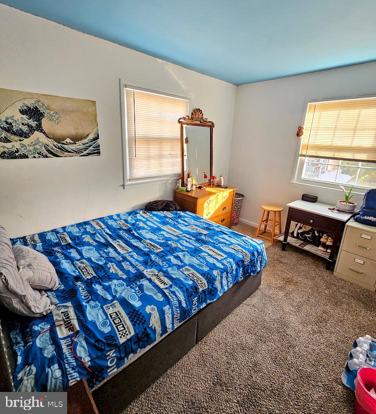 13316 Foxhall Drive Silver Spring, MD 20906 - Photo 20 of 32 a bedroom with bed and window