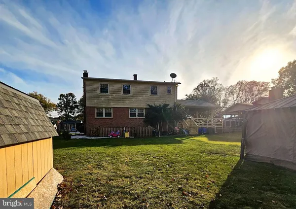 a view of yard with patio