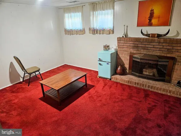 a living room with a fireplace