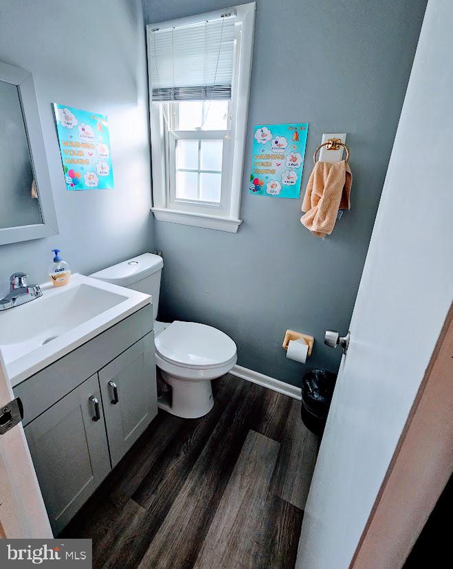 13316 Foxhall Drive Silver Spring, MD 20906 - Photo 9 of 32 a bathroom with a sink toilet and window