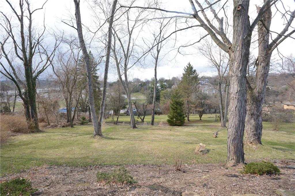 2017 Mohawk Road Pittsburgh, PA 15241 - Photo 22 of 23 Lots of trees and a couple of level areas of this delightful, large backyard.