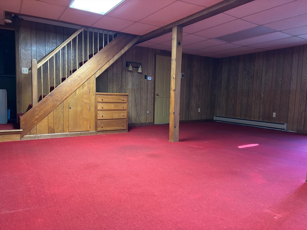 14 Pebble Ridge Road Amherst, MA 01002 - Photo 18 of 32 a view of empty room with wooden floor and windows