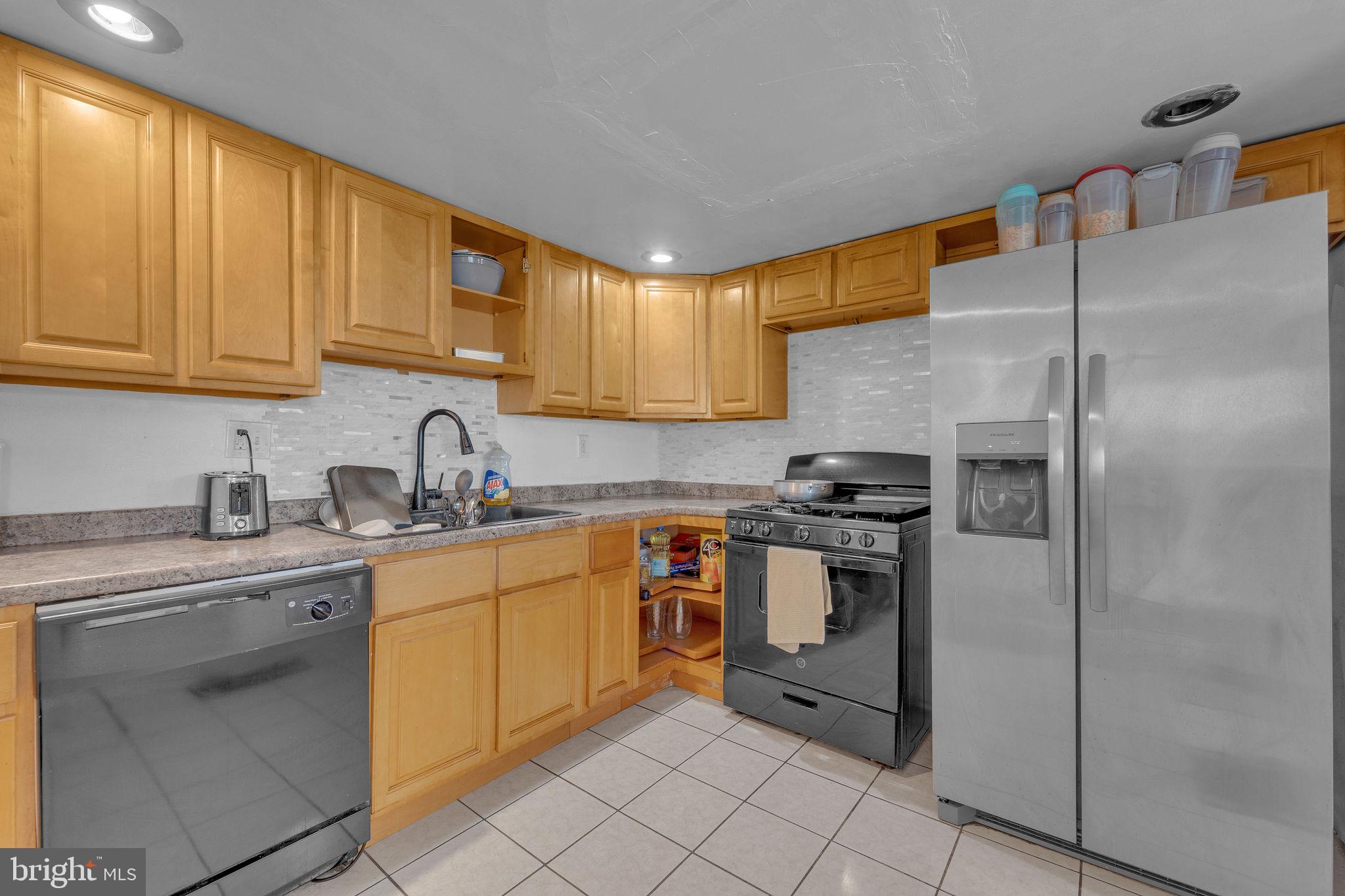 733 Myrtle Avenue Lindenwold, NJ 08021 - Photo 11 of 29 Modern kitchen with warm wood tones.