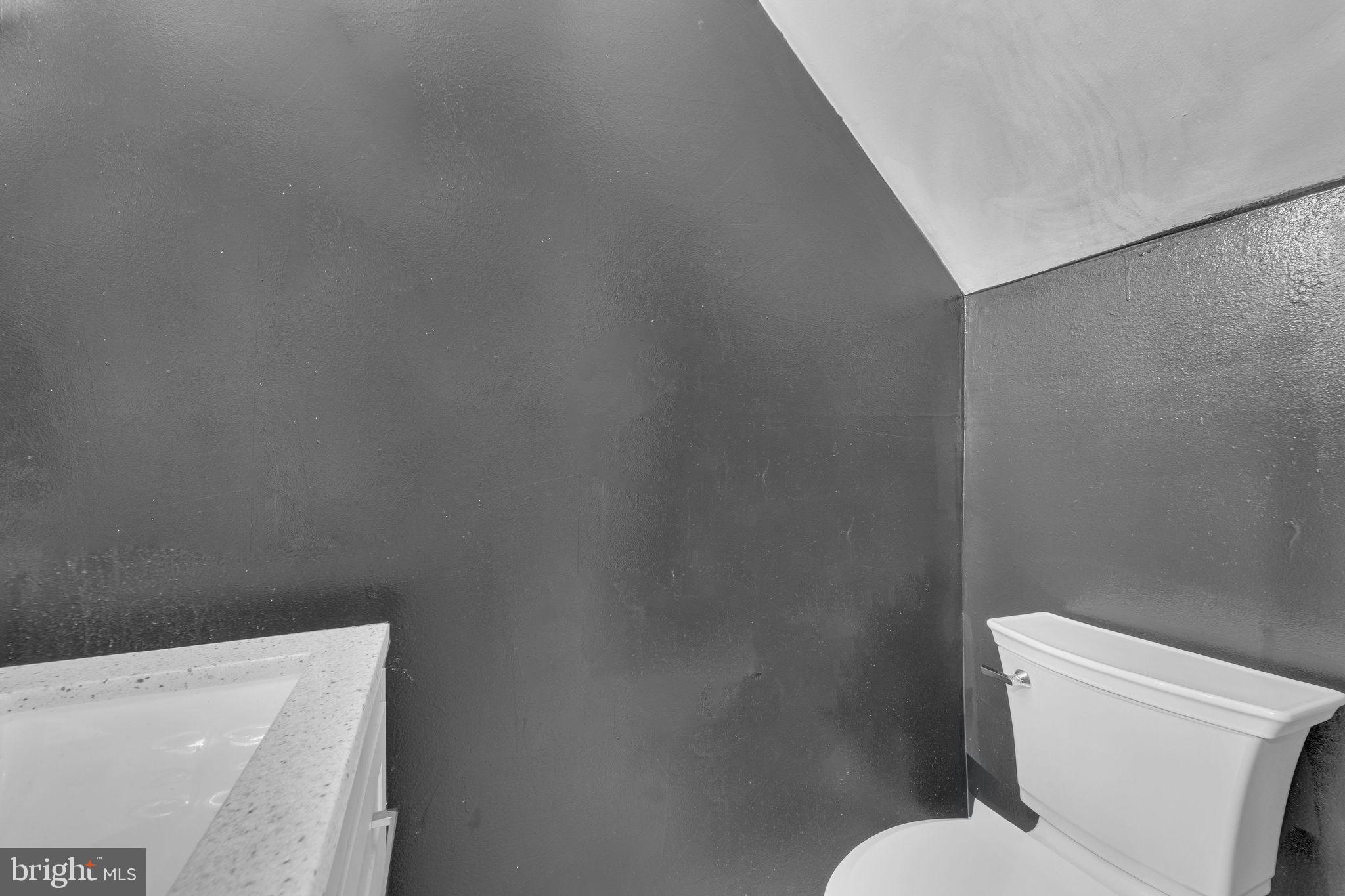 733 Myrtle Avenue Lindenwold, NJ 08021 - Photo 6 of 29 Chic monochrome bathroom retreat.