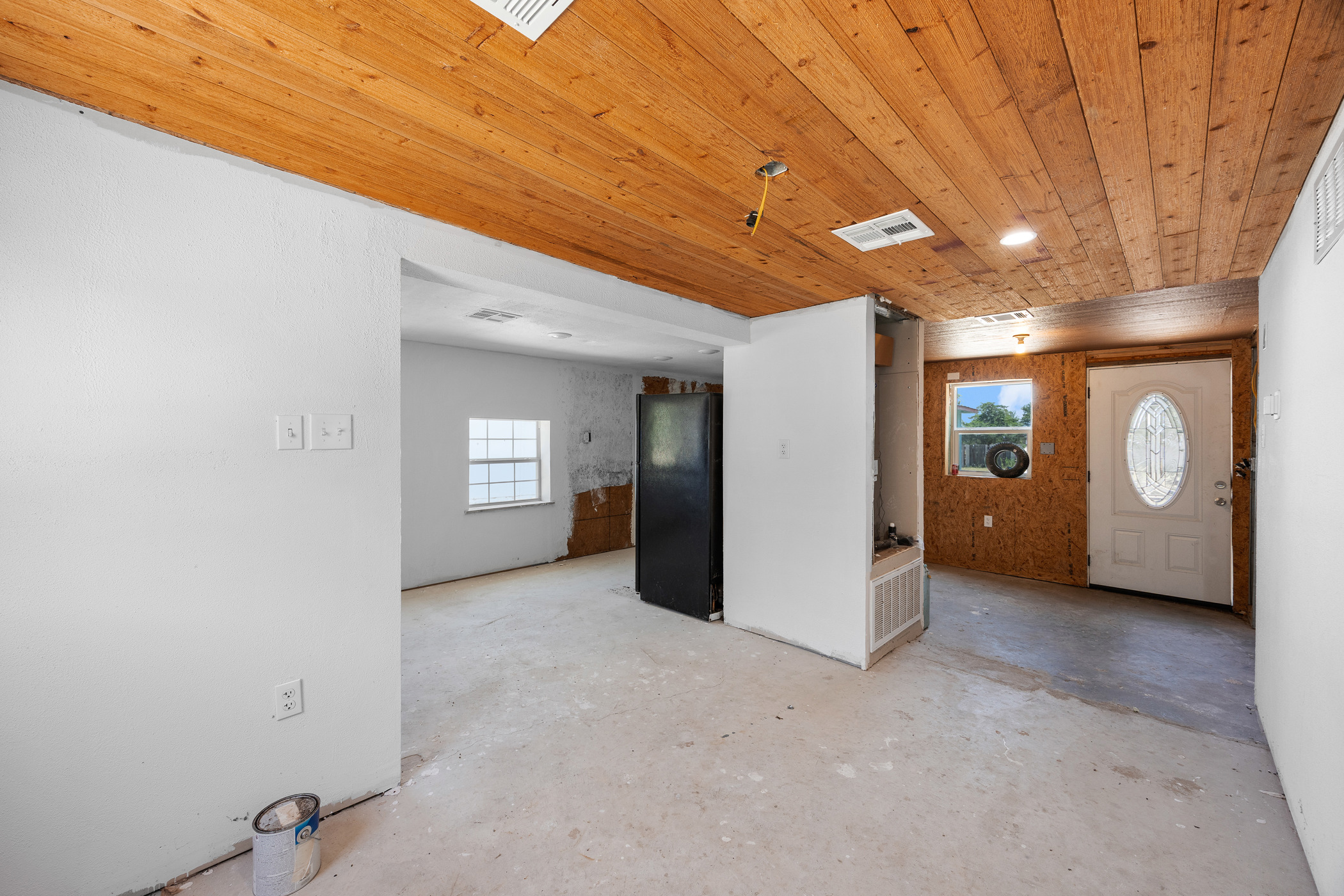 147 Community Center Road Rosanky, TX 78953 - Photo 24 of 33 a view of a hallway with wooden shelves