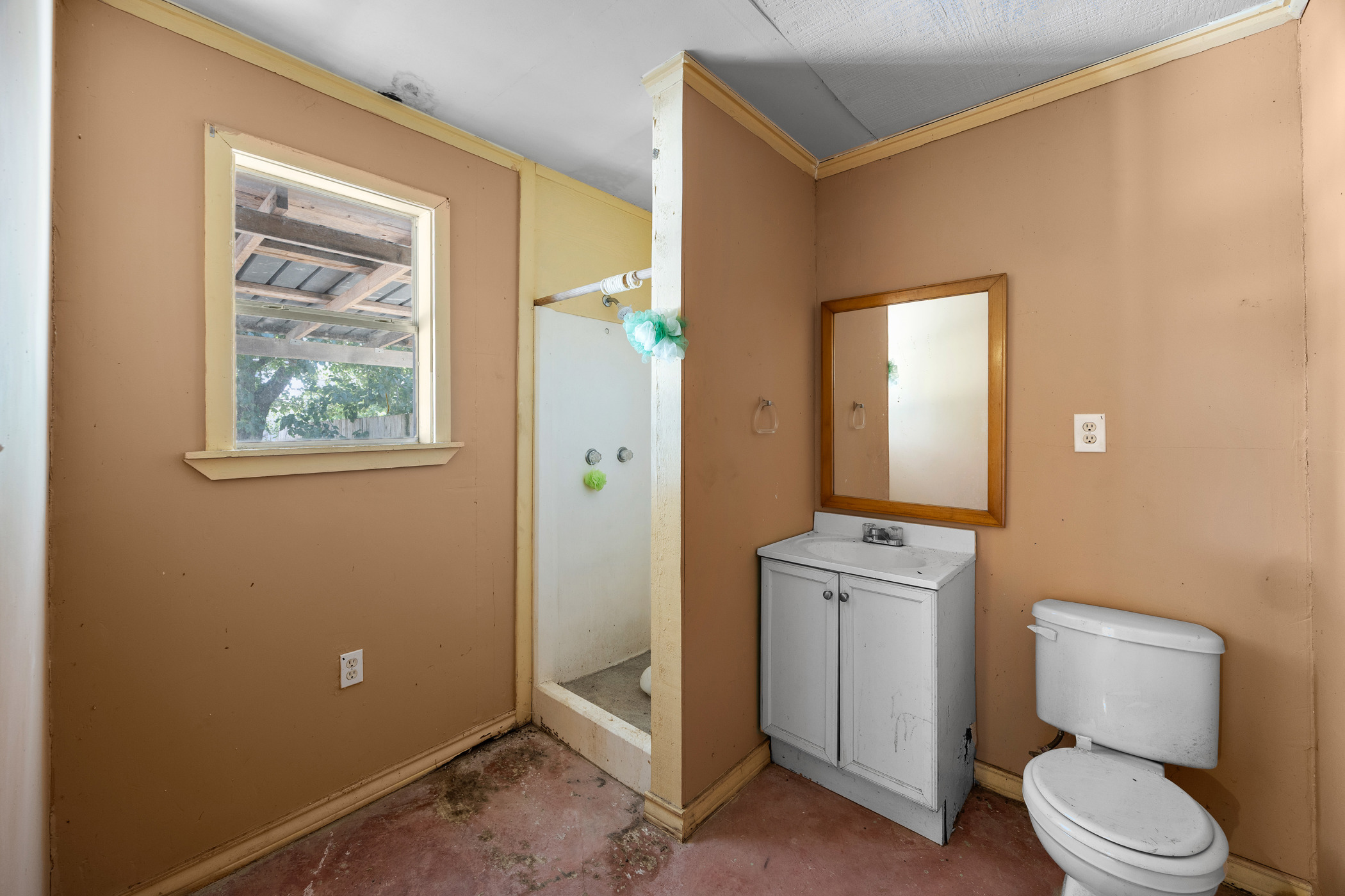 147 Community Center Road Rosanky, TX 78953 - Photo 28 of 33 a bathroom with a toilet a sink a vanity and mirror