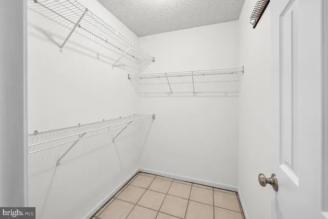 a view of a room with racks on the wall