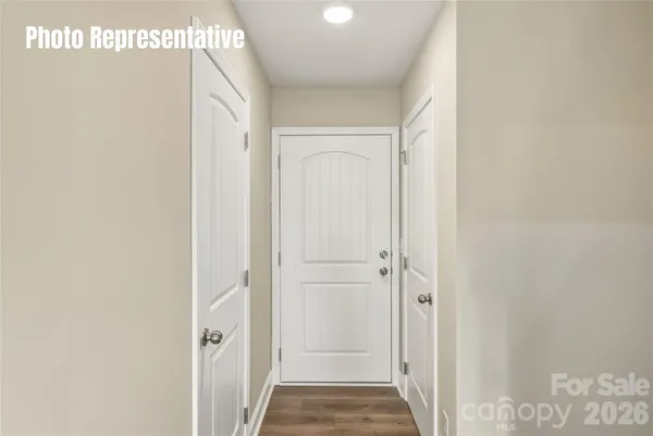 a view of hallway with stairs