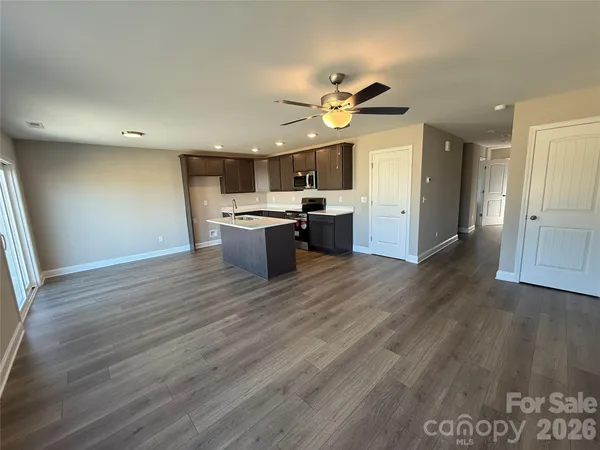 a view of a kitchen with a sink and dishwasher