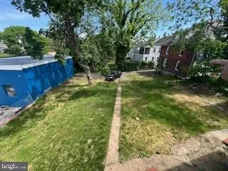 a view of backyard with green space