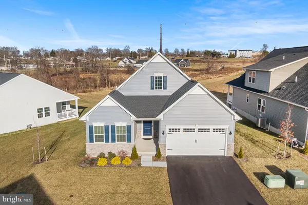 a view of a house with a big yard