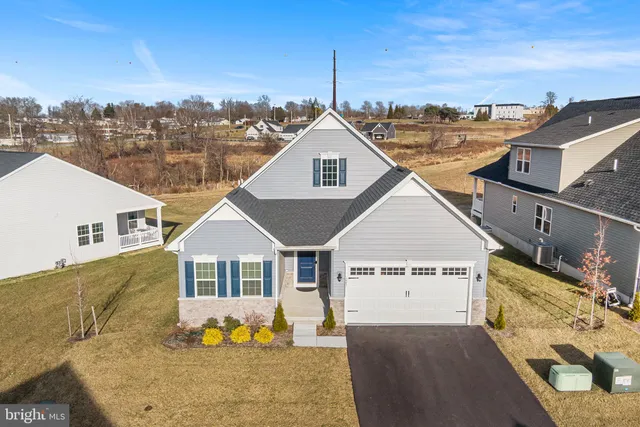 a view of a house with a big yard