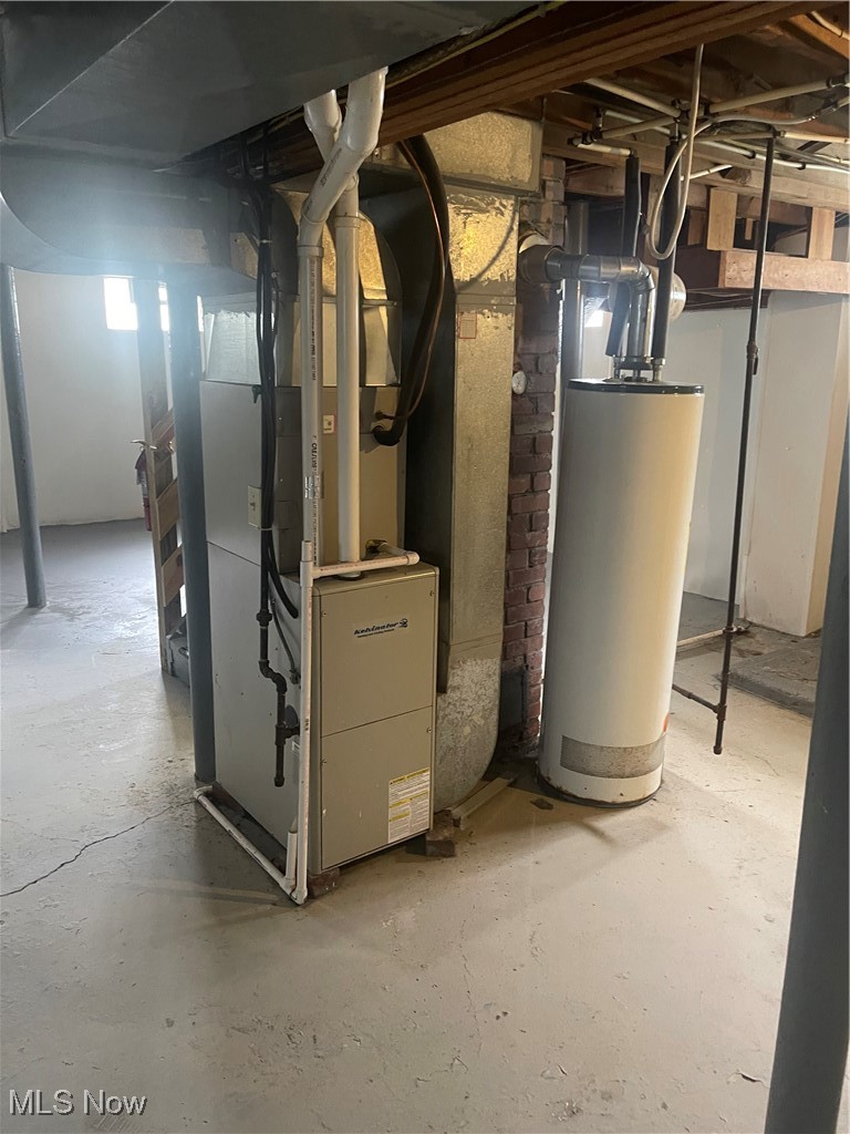 1881 17th Street Southwest Akron, OH 44314 - Photo 19 of 20 Utilities with water heater and heating unit