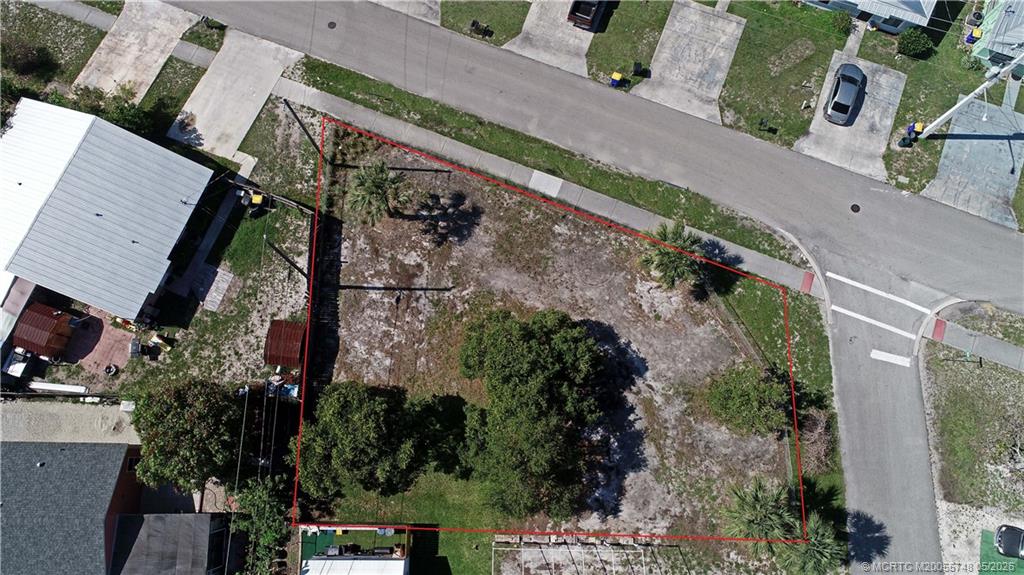 5152 Southeast Primrose Way Stuart, FL 34997 - Photo 2 of 13 an aerial view of a house