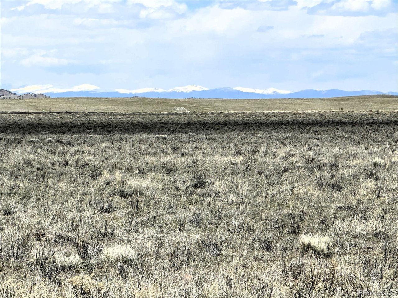 Wichita Trail Hartsel, CO 80449 - Photo 3 of 20 a view of a lake from a yard