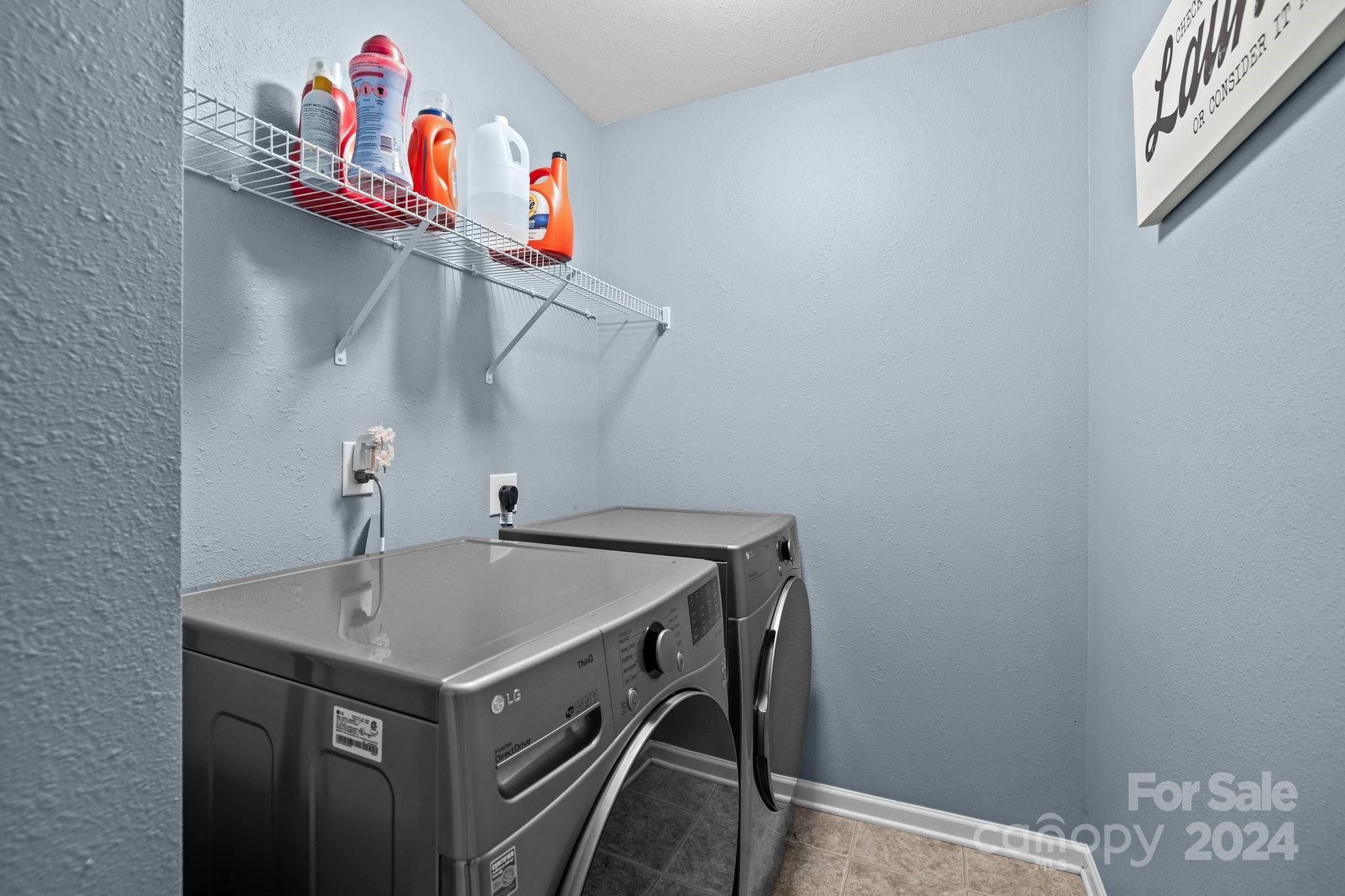 5511 Keener Ridge Road Charlotte, NC 28216 - Photo 14 of 31 a utility room with dryer and washer