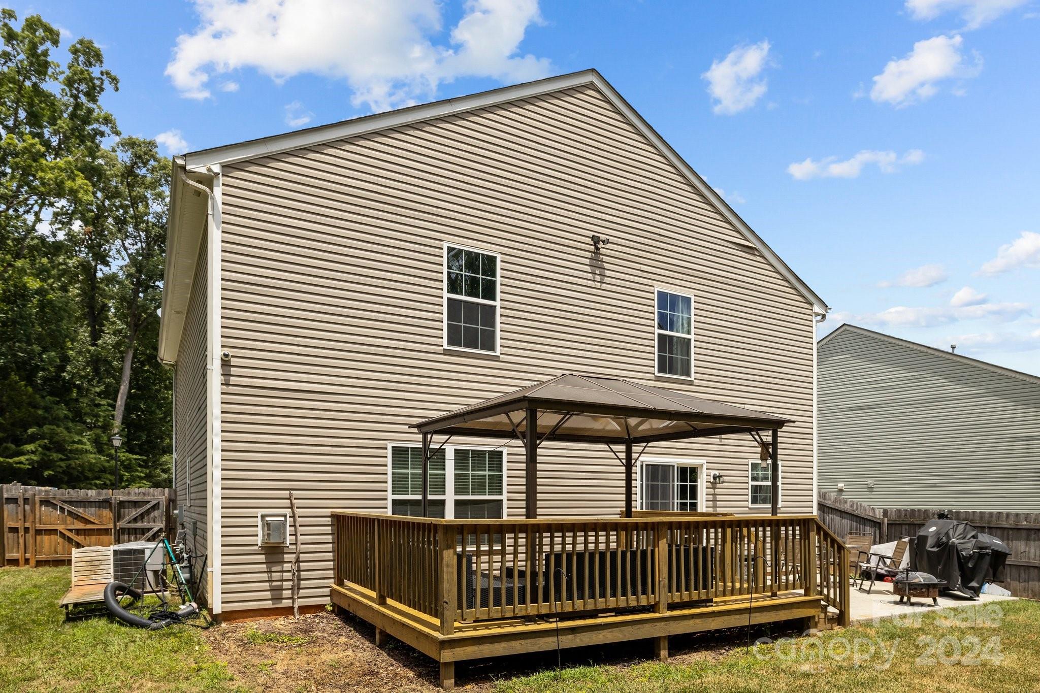 5511 Keener Ridge Road Charlotte, NC 28216 - Photo 6 of 31 a view of a house with a deck