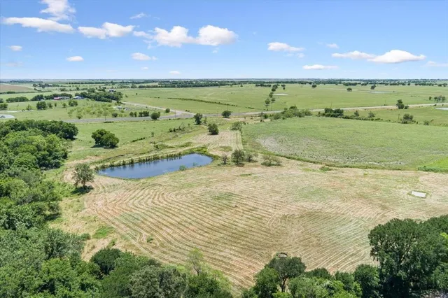 a view of an ocean and city