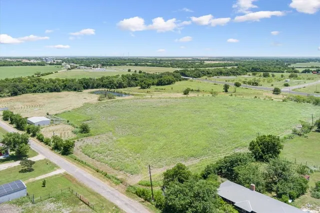 a view of an ocean and city