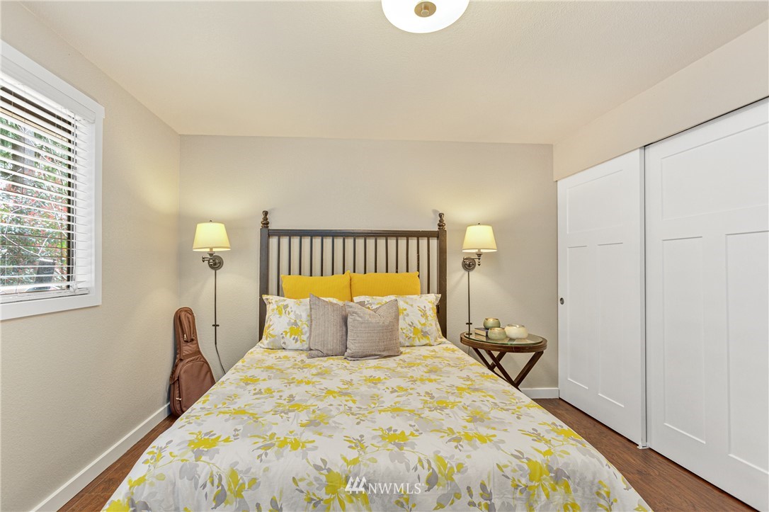 804 Duchess Road Bothell, WA 98012 - Photo 14 of 37 a bedroom with a bed and a window