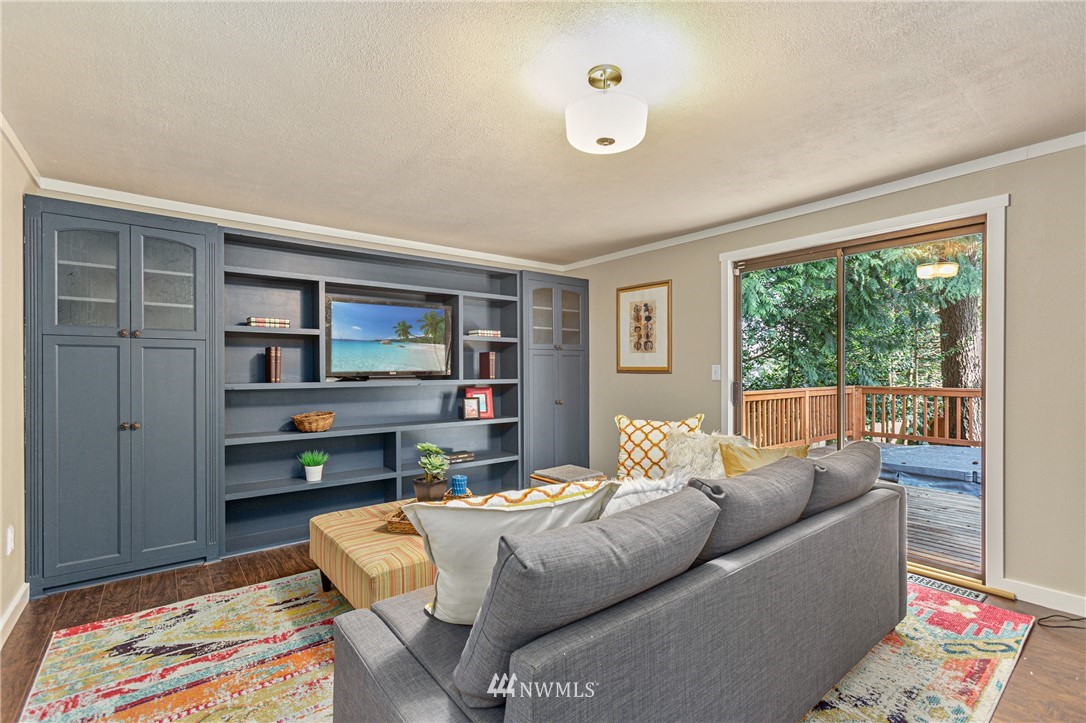 804 Duchess Road Bothell, WA 98012 - Photo 22 of 37 a living room with furniture and a window