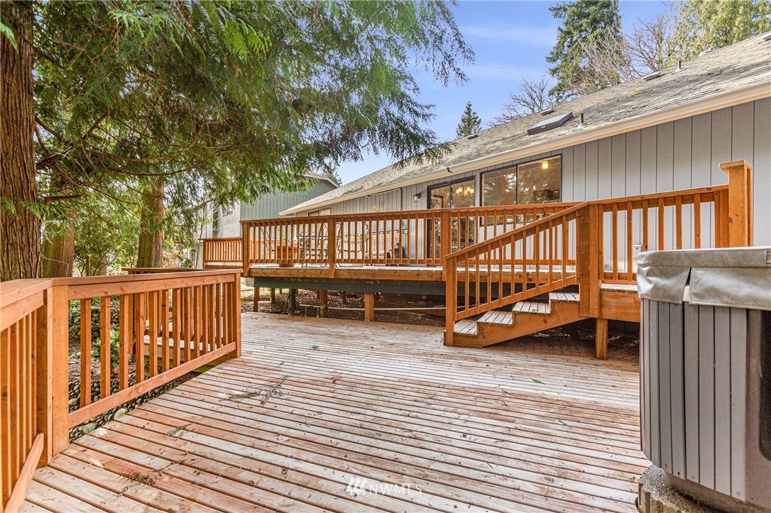 804 Duchess Road Bothell, WA 98012 - Photo 28 of 37 a view of balcony with deck and wooden floor
