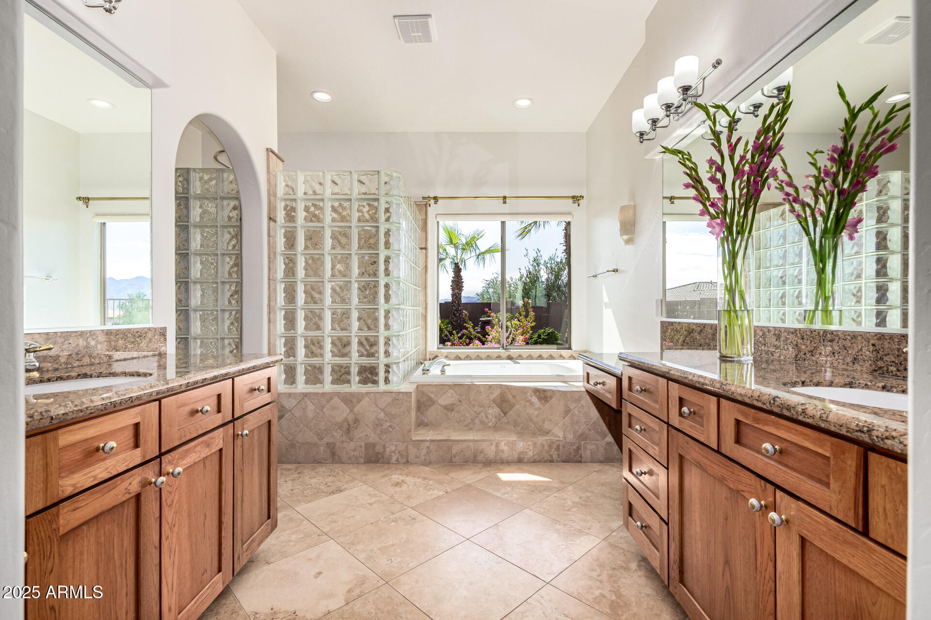 16030 South 27th Drive Phoenix, AZ 85045 - Photo 11 of 29 a large kitchen with kitchen island granite countertop a large window and a counter space