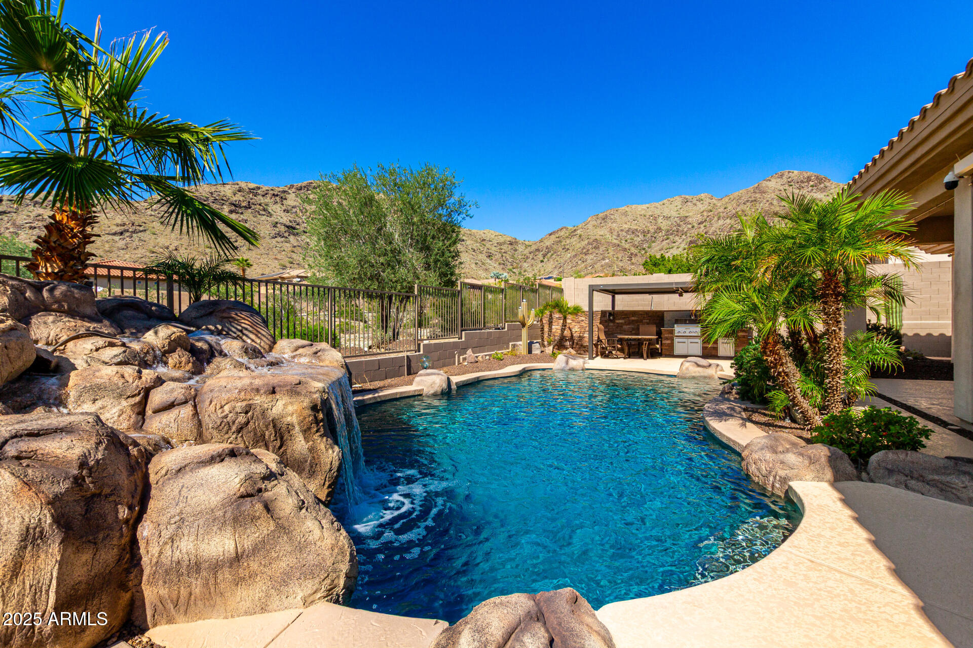 16030 South 27th Drive Phoenix, AZ 85045 - Photo 18 of 29 a view of a house with a swimming pool