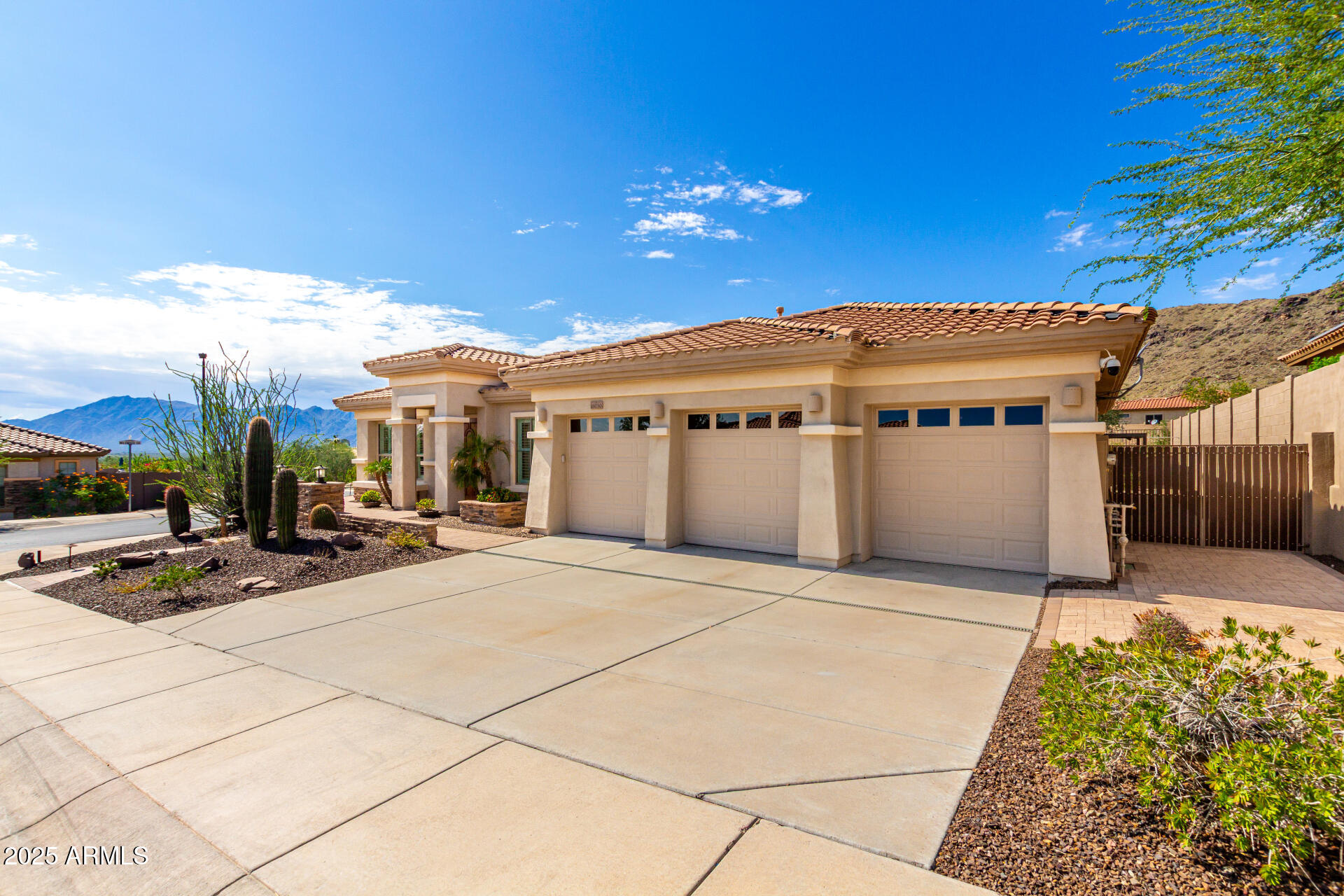 16030 South 27th Drive Phoenix, AZ 85045 - Photo 2 of 29 a view of a house with swimming pool and sitting area