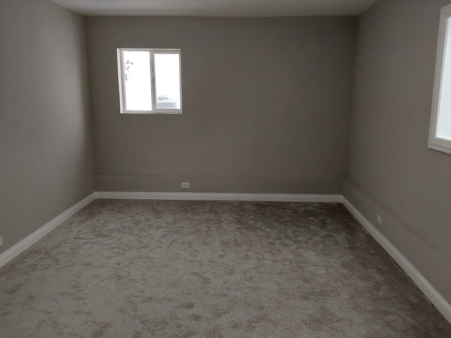 7712 South Evans Avenue Chicago, IL 60619 - Photo 13 of 22 a view of a window in an empty room