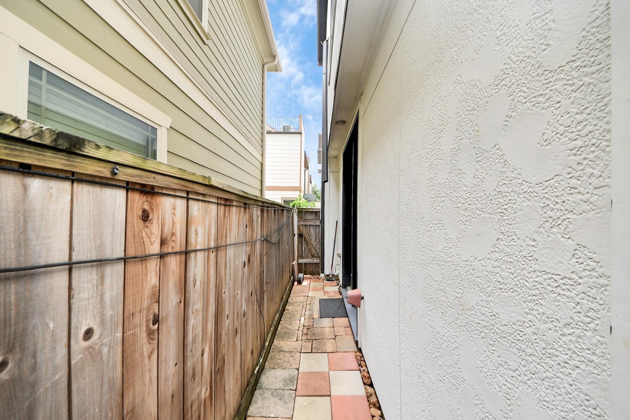 5617 Kiam Street, Unit A Houston, TX 77007 - Photo 42 of 46 a view of a balcony with wooden floor and door
