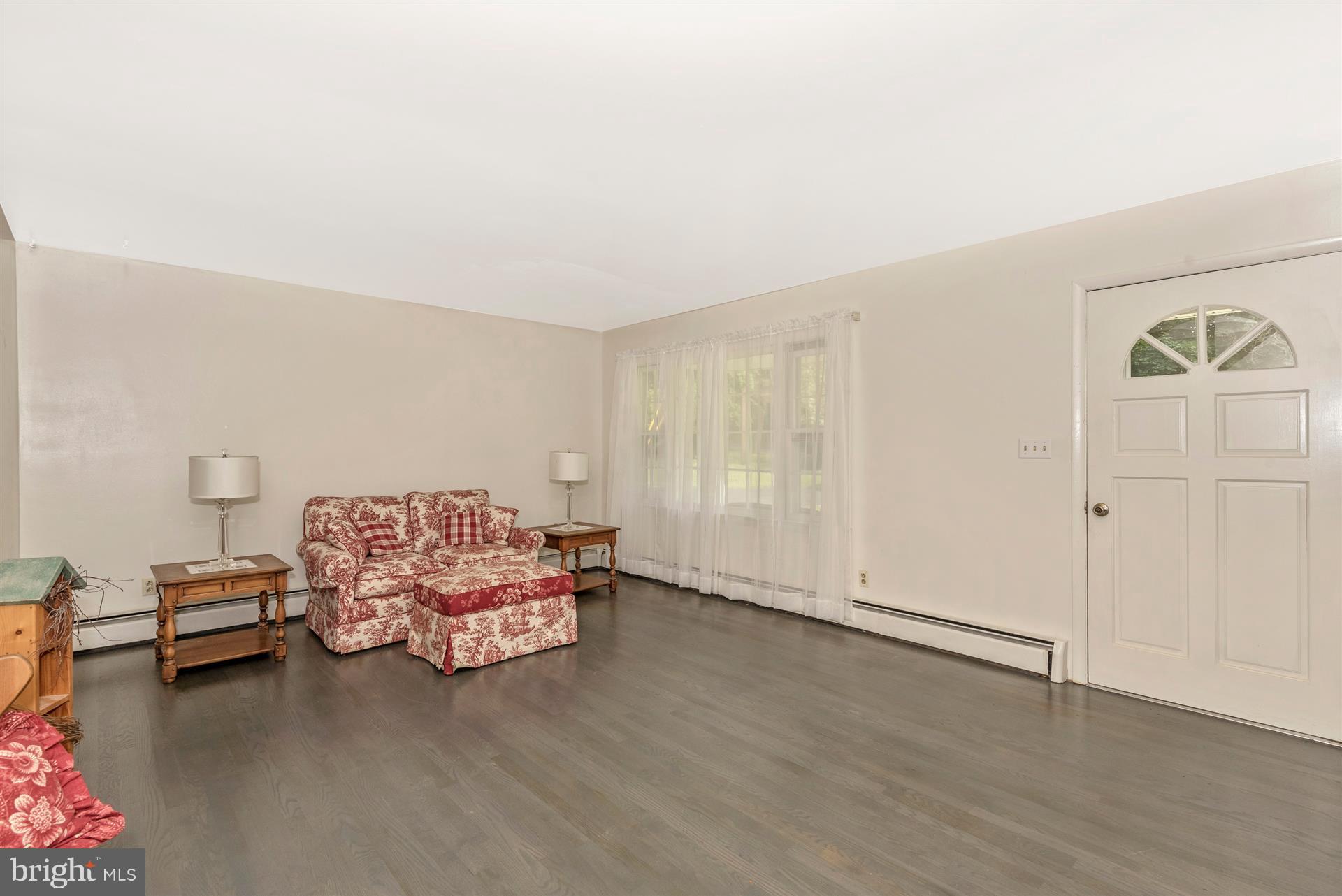 7829 Rocky Road Gaithersburg, MD 20882 - Photo 19 of 32 Living Room (New floors throughout the home)