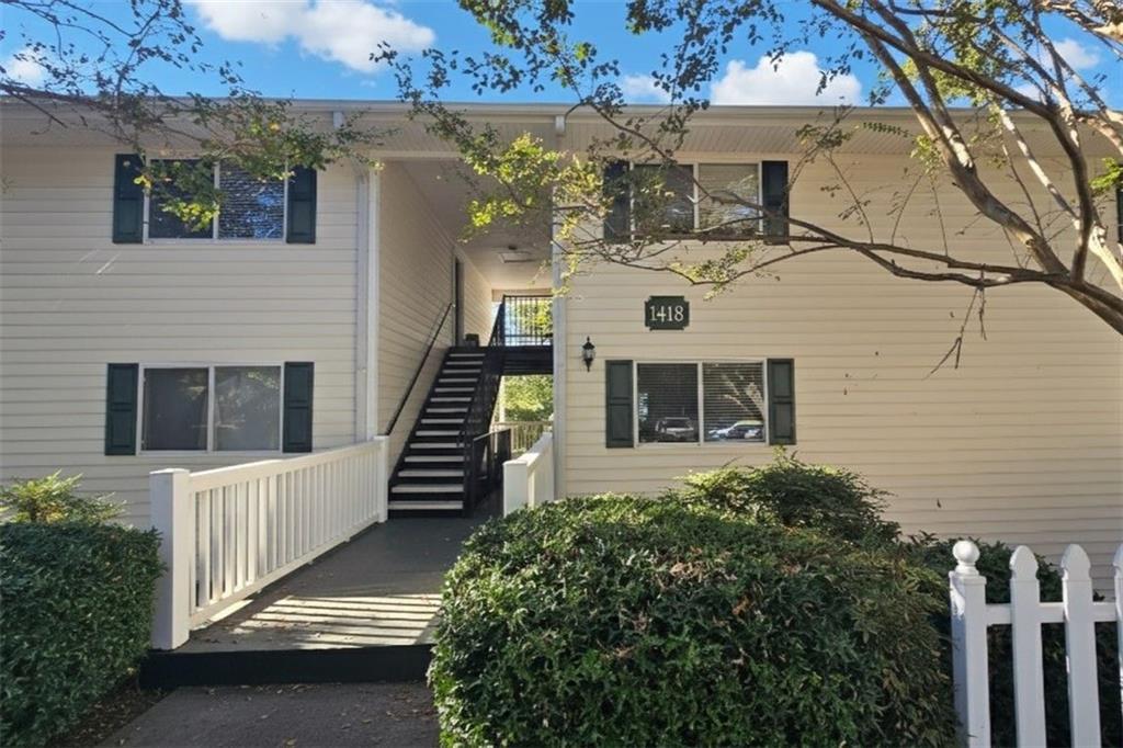 1418 Foxhall Lane Southeast, Unit 8 Atlanta, GA 30316 - Photo 1 of 50 an aerial view of a house with a yard