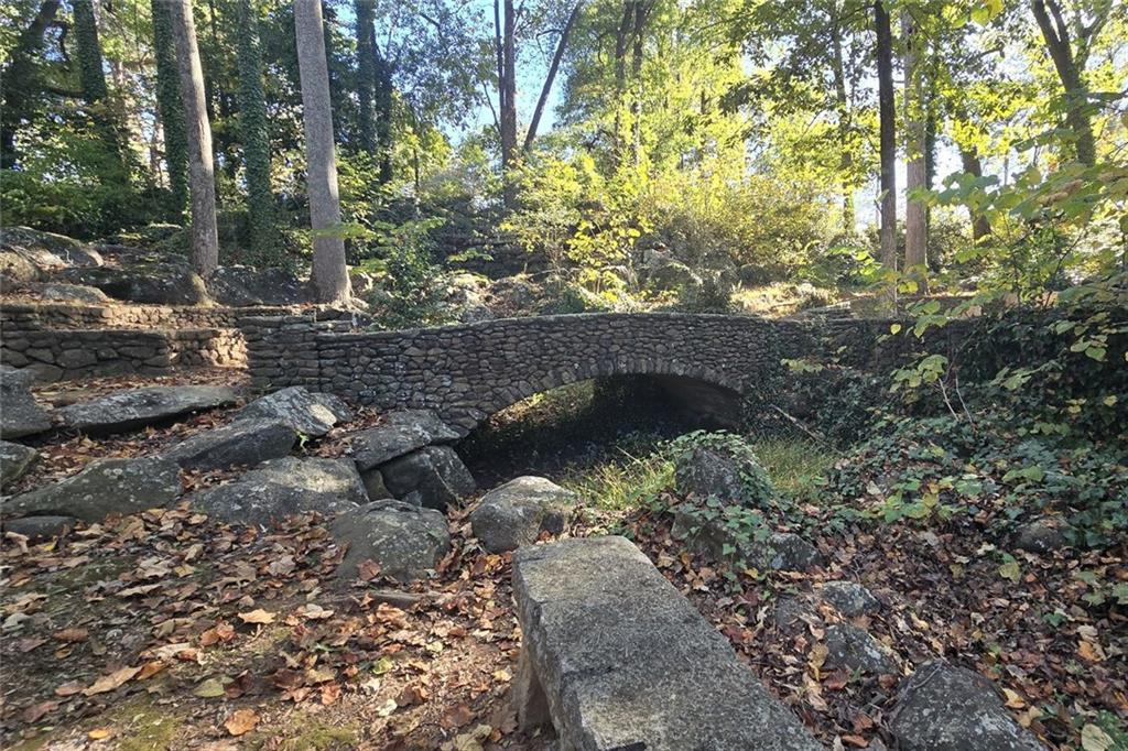 1418 Foxhall Lane Southeast, Unit 8 Atlanta, GA 30316 - Photo 12 of 50 a view of a tree with a yard