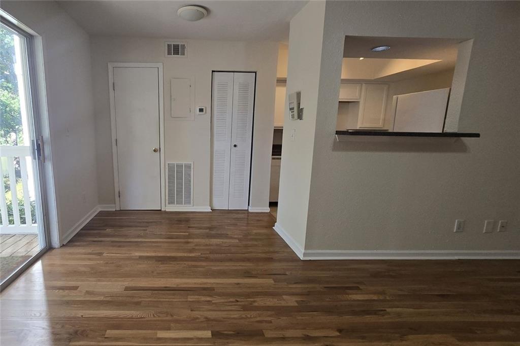 1418 Foxhall Lane Southeast, Unit 8 Atlanta, GA 30316 - Photo 15 of 50 a view of a room with wooden floor and entryway
