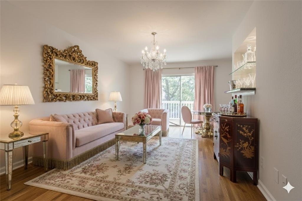 1418 Foxhall Lane Southeast, Unit 8 Atlanta, GA 30316 - Photo 2 of 50 a living room with furniture and a chandelier