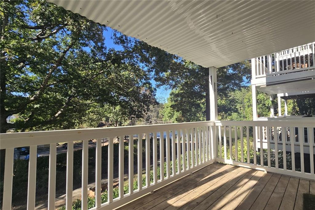 1418 Foxhall Lane Southeast, Unit 8 Atlanta, GA 30316 - Photo 23 of 41 a view of a wooden balcony