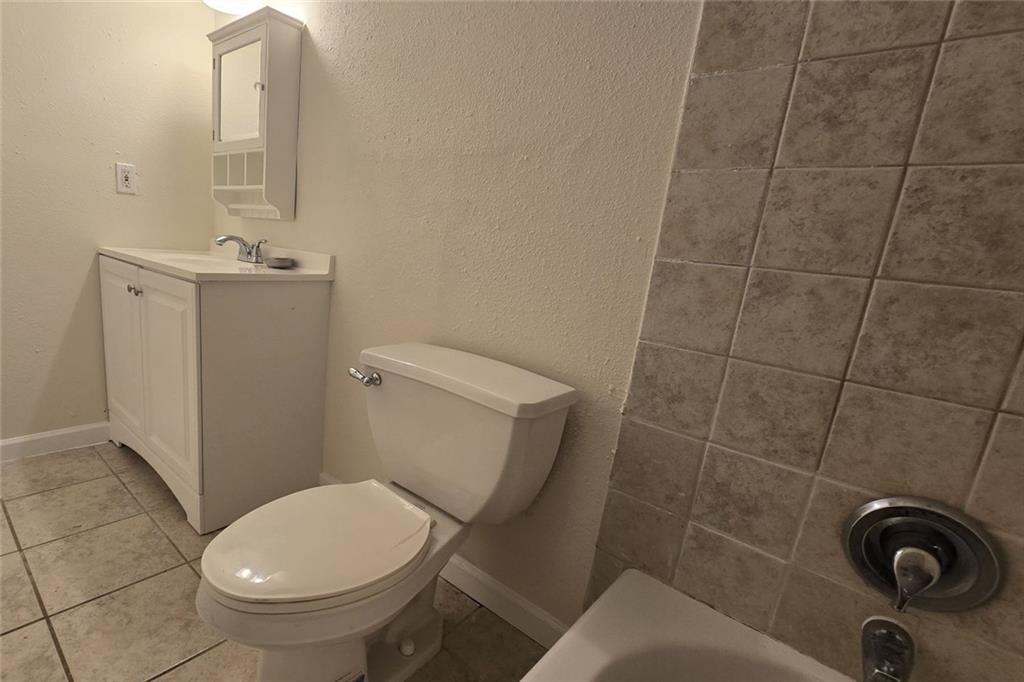 1418 Foxhall Lane Southeast, Unit 8 Atlanta, GA 30316 - Photo 30 of 50 a bathroom with a toilet and a sink