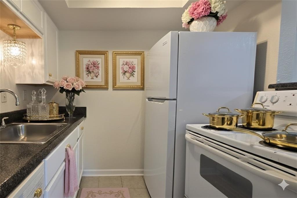 1418 Foxhall Lane Southeast, Unit 8 Atlanta, GA 30316 - Photo 3 of 50 a kitchen with stainless steel appliances granite countertop a sink stove and refrigerator
