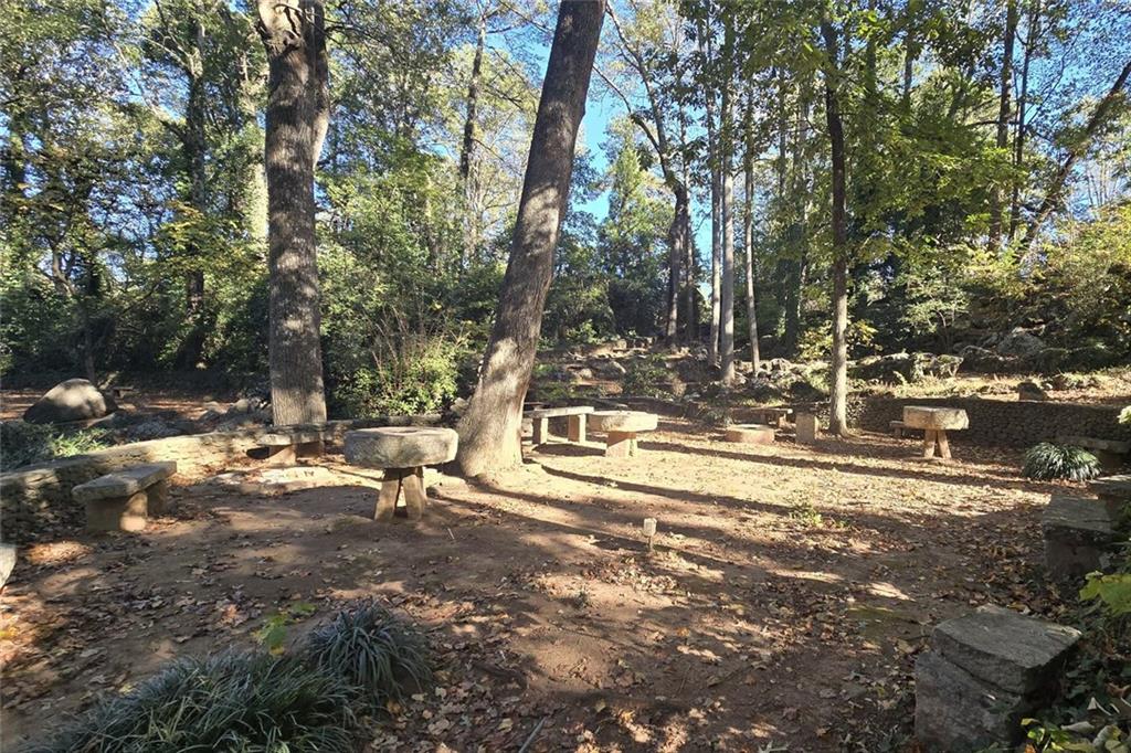 1418 Foxhall Lane Southeast, Unit 8 Atlanta, GA 30316 - Photo 32 of 41 a view of yard with wooden fence and large trees