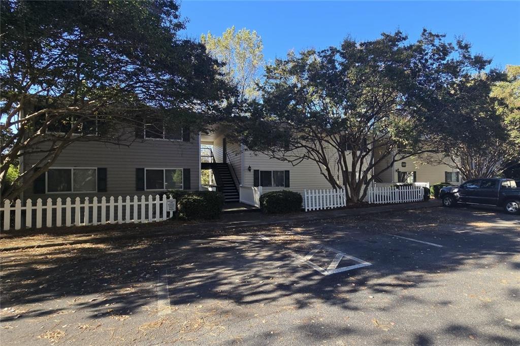1418 Foxhall Lane Southeast, Unit 8 Atlanta, GA 30316 - Photo 33 of 50 a view of a house with a yard
