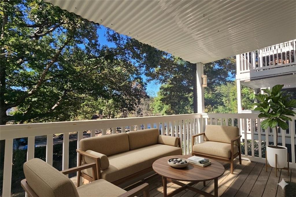 1418 Foxhall Lane Southeast, Unit 8 Atlanta, GA 30316 - Photo 4 of 41 a roof deck with couches and potted plants